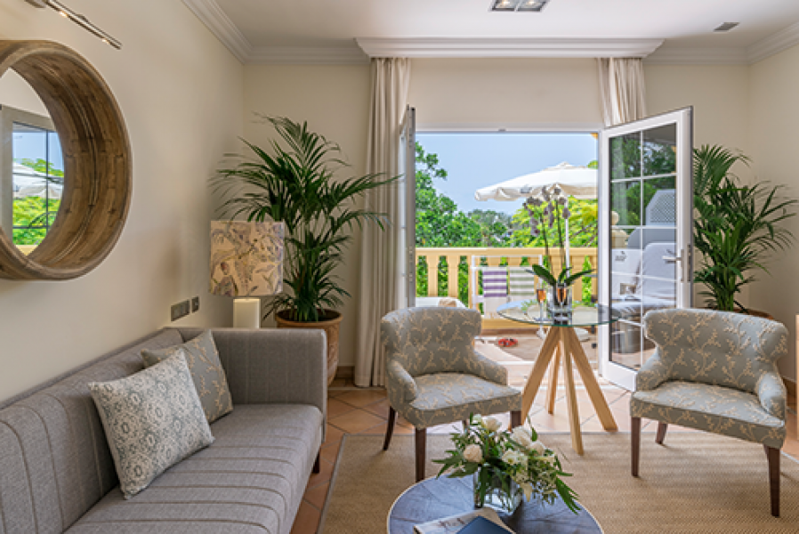 Bahia del Duqu Casas Ducales Suite Vistas Jardin Baja Living Room2