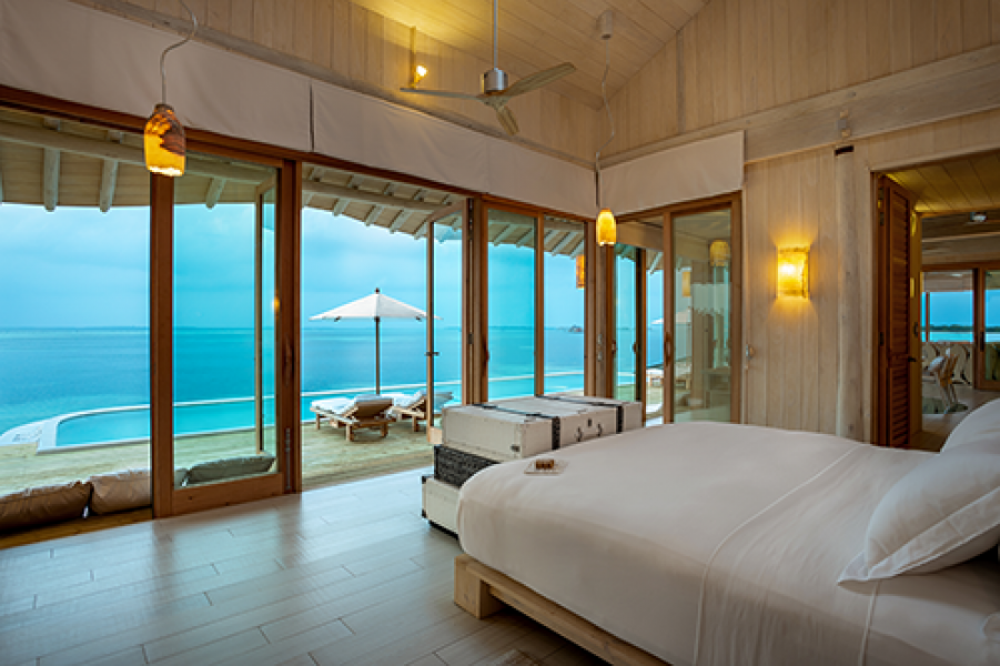 Soneva Jani 2BR Water Reserve master bedroom with views by Sandro Bruecklmeier.
